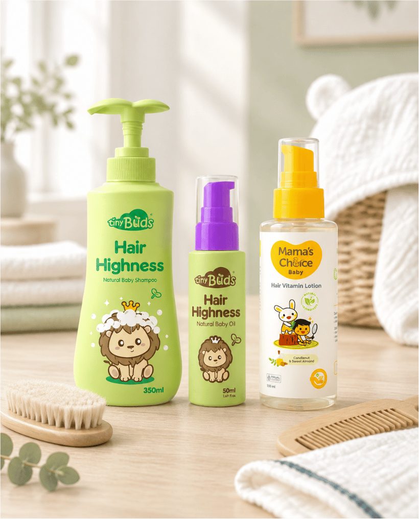Baby hair shampoo, hair oil and hair lotion beside a soft baby brush